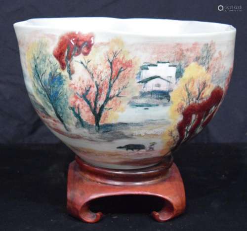 A large Chinese studio pottery scalloped bowl painted with l...