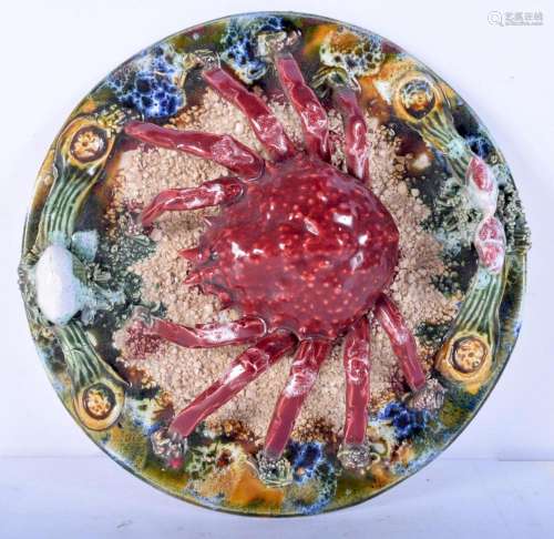 A Majolica Palissy style wall plate decorated with a crab. 2...