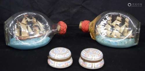 Two vintage ships in bottles together with two hinged lidded...