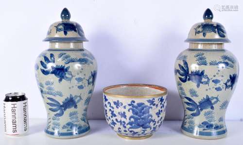 A pair of Chinese lidded pots together with a brass rimmed C...