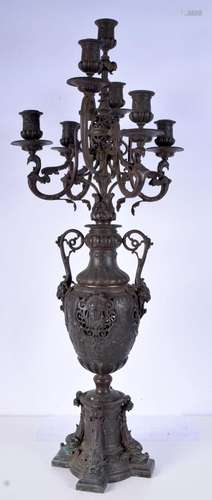 A large French bronze standing candelabra. 80cm