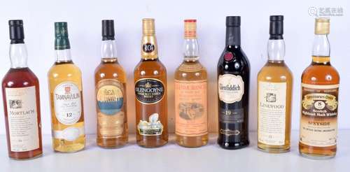 A collection of bottled Scotch Whiskey, Tamnavulin, Mortlach...