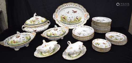 A Naples porcelain dinner service decorated with Swans and o...