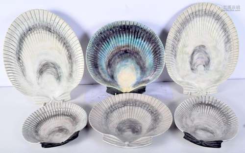 A collection of European shell dishes largest 34 cm. (6)