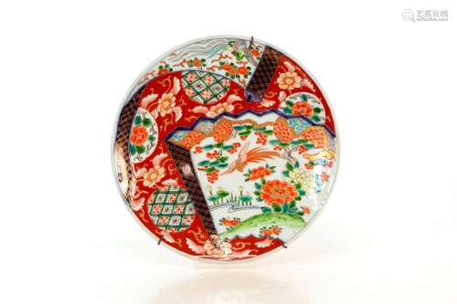 A pair of Japanese Imari plates,decorated in the traditional...
