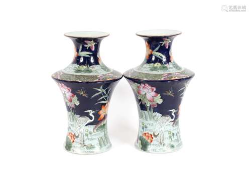 A pair of Chinese baluster vases,profusely decorated blossom...
