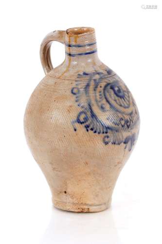 An antique Rhenish ware pottery flagon,having stylised blue ...