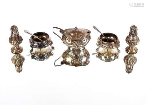 A pair of Victorian silver salts,having embossed floral deco...