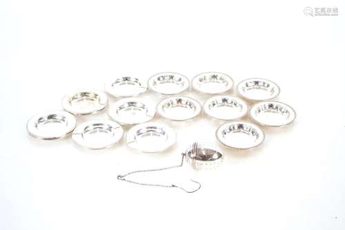 Fifteen small continental white metal dishes and ashtrays;an...