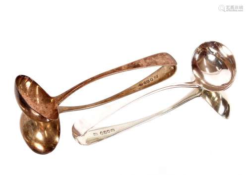 A pair of George III silver Old English pattern sauce ladles...