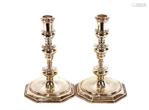 A pair of good quality silver candlesticks,by The Goldsmiths...