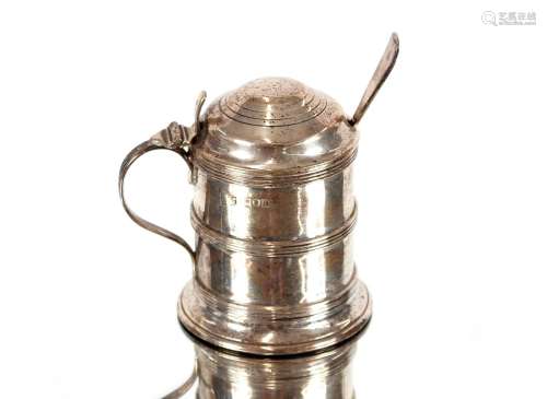 A George V silver tankard shaped mustard pot,and associated ...
