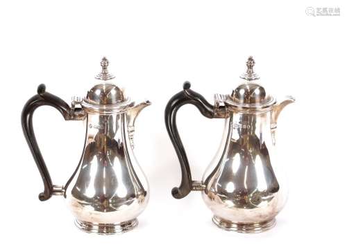A George V silver baluster coffee pot,the domed lid surmount...
