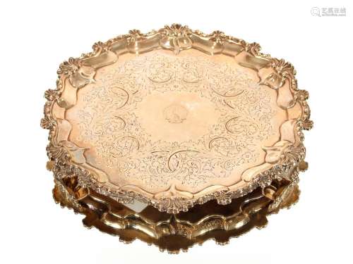 A Victorian silver salver,with shell and foliate pie crust b...