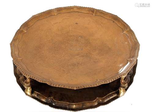 A George III silver salver,having pie crust and gadrooned bo...