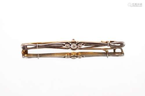 A 15ct gold bar brooch,set three diamonds