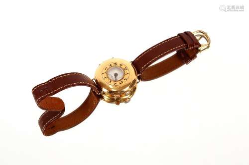 An 18ct gold half hunter wrist watch,having blue enamelled n...