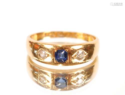 A gold sapphire and diamond set ring