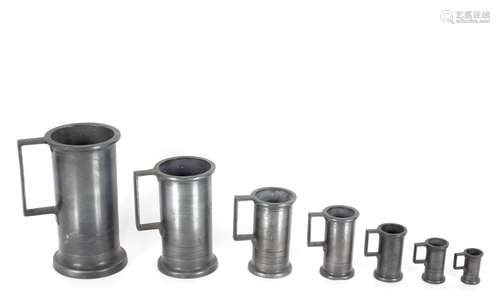 A set of seven antique pewter measures,of baluster form