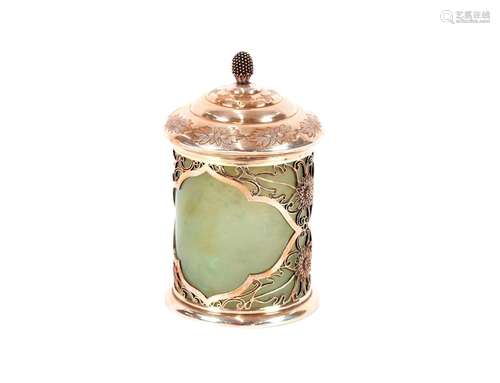 A Chinese cylindrical box and cover,the celadon jade body ca...