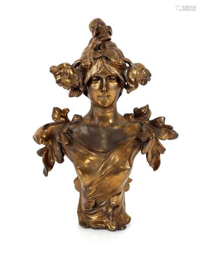 A gilded Art Nouveau bust,depicting young maiden with flower...