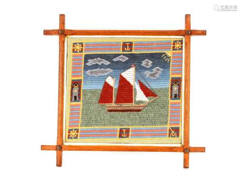 A 19th Century wool work embroidery,of a ship in oak Oxford ...