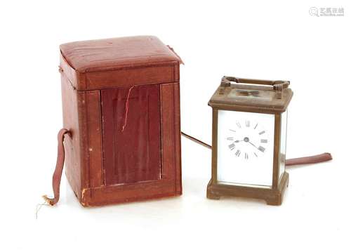 A brass cased carriage timepiece,in leather travelling case