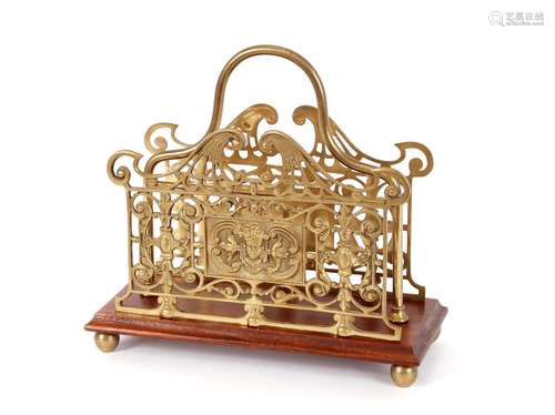 A mahogany and brass two division magazine rack,with pierced...