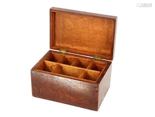 A Georgian oak storage box,the hinged lid opening to reveal ...