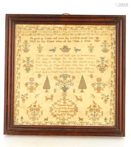 An early 19th Century sampler, decorated with verse, trees a...