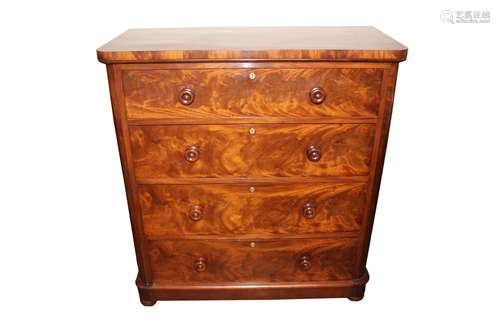 An unusual Victorian mahogany chest,of four drawers, the upp...