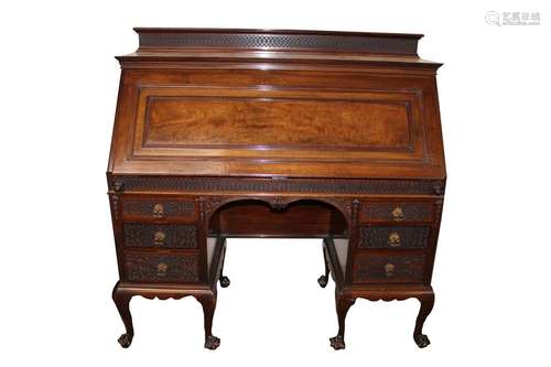 A late Victorian mahogany bureau,having fret carved decorati...