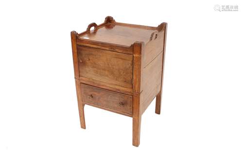 A Georgian mahogany tray top bedside cabinet,enclosed by a s...