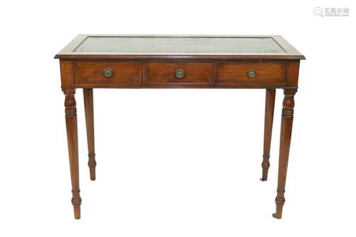 A mahogany writing table, the green leatherette inset top ab...