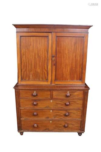 A 19th Century mahogany cabinet on chest,the upper section f...