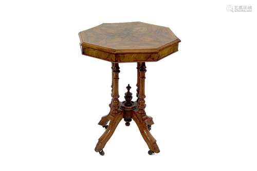 A Victorianoctagonal walnut occasional table,raised on turne...