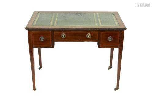 An Edwardian writing table, with leather inset top