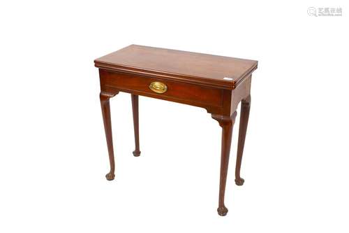 A mid 18th Century mahogany fold-over tea table,fitted with ...