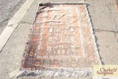 A Caucasian pattern rug, with stylised floral deco