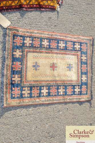 A small Afghan Gazak pattern rug, 3 x 23