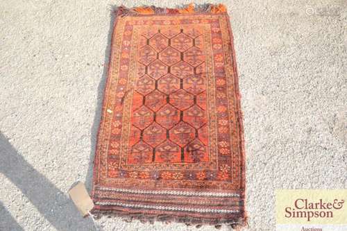 A Baluchi bag rug, 23 x 4