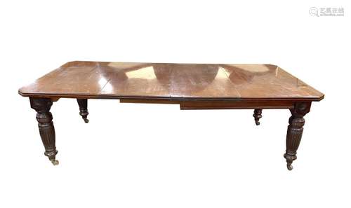 A late Victorian mahoganyextendingdining table,the canted co...