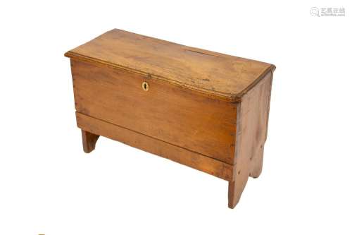 An antique elm coffer,of small size raised on shaped end sup...