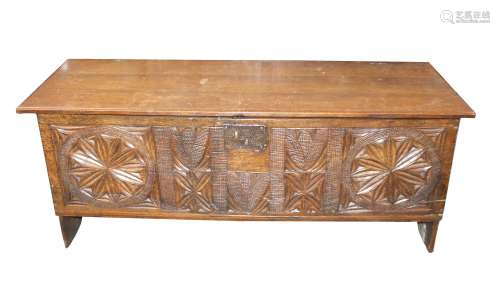 An antiquecarved oak coffer,with square iron lock plate, rou...