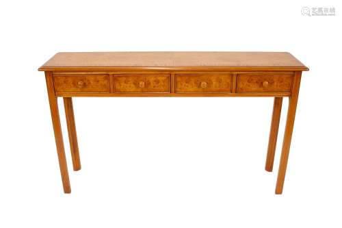 A burr oak hall table,fitted four drawers, 131cm wide