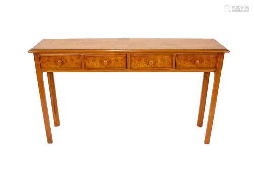 A burr oak hall table,fitted four drawers, 131cm wide