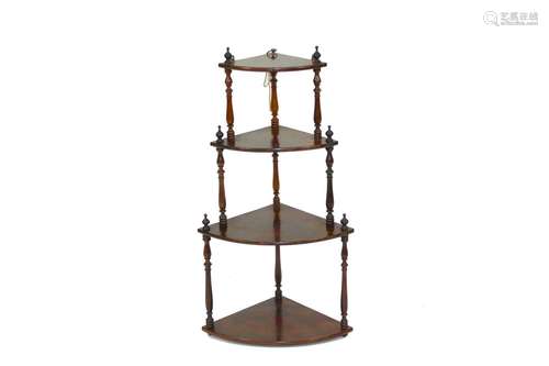 An early 19th Century rosewood bow fronted four tier graduat...