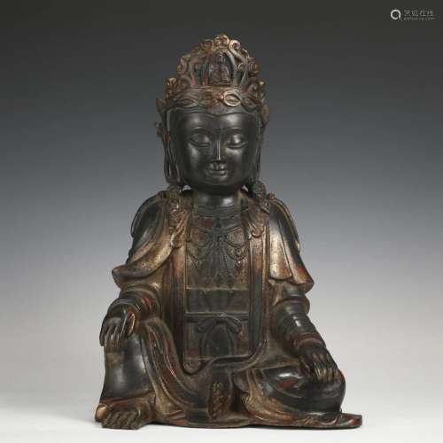 A CHINESE GILT-BRONZE SEATED FIGURE OF GUANYIN, QING