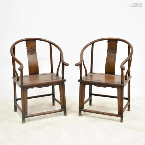 PAIR OF HUANGHUALI HORSESHOE ARM CHAIRS