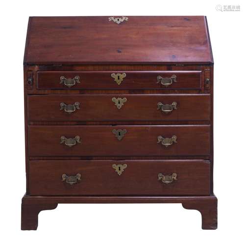 AN EARLY GEORGE III MAHOGANY BUREAU THIRD QUARTER 18TH CENTU...